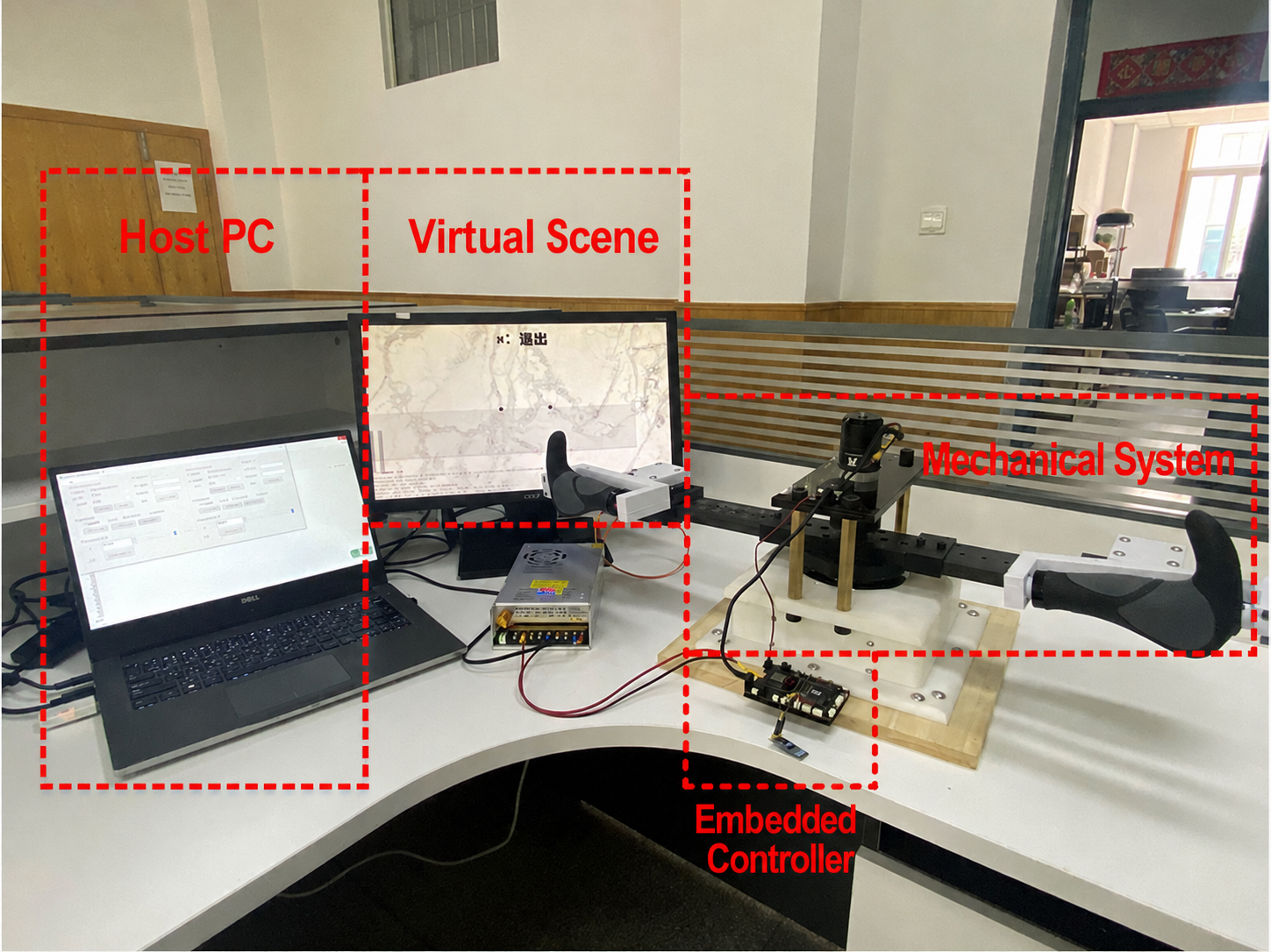 Assembled Akso prototype: host PC, virtual scene, embedded controller, and mechanical system